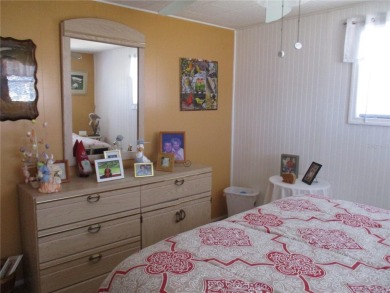 YOU'RE GONNA LOVE THIS 2 BEDROOM 2 BATH PARTIALLY FURNISHED on Heather Hills Golf Course in Florida - for sale on GolfHomes.com, golf home, golf lot