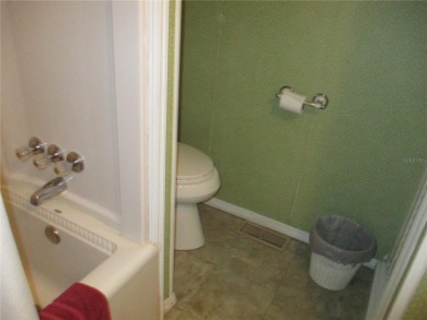 YOU'RE GONNA LOVE THIS 2 BEDROOM 2 BATH PARTIALLY FURNISHED on Heather Hills Golf Course in Florida - for sale on GolfHomes.com, golf home, golf lot