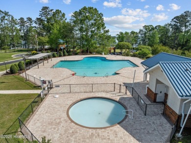 Welcome to your dream home in the prestigious Cypress Landing on Cypress Landing Golf Club in North Carolina - for sale on GolfHomes.com, golf home, golf lot