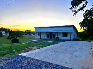 Extremely Low AC bills - $48 in June, $59 in July, set at 72 on Hilltop Lakes Resort Golf Club in Texas - for sale on GolfHomes.com, golf home, golf lot