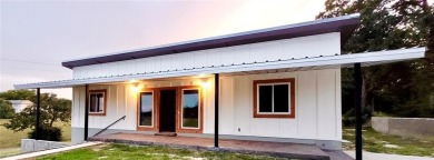 Extremely Low AC bills - $48 in June, $59 in July, set at 72 on Hilltop Lakes Resort Golf Club in Texas - for sale on GolfHomes.com, golf home, golf lot