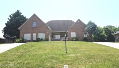 This spacious 3,380 sq ft brick and stone ranch-style home in on Royal Oaks Golf Club in Tennessee - for sale on GolfHomes.com, golf home, golf lot