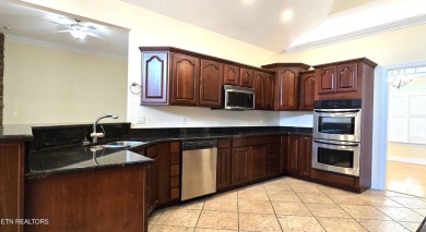 This spacious 3,380 sq ft brick and stone ranch-style home in on Royal Oaks Golf Club in Tennessee - for sale on GolfHomes.com, golf home, golf lot