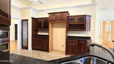 This spacious 3,380 sq ft brick and stone ranch-style home in on Royal Oaks Golf Club in Tennessee - for sale on GolfHomes.com, golf home, golf lot