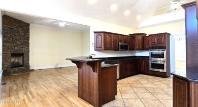 This spacious 3,380 sq ft brick and stone ranch-style home in on Royal Oaks Golf Club in Tennessee - for sale on GolfHomes.com, golf home, golf lot