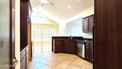 This spacious 3,380 sq ft brick and stone ranch-style home in on Royal Oaks Golf Club in Tennessee - for sale on GolfHomes.com, golf home, golf lot