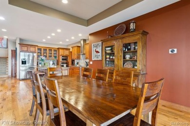 Welcome to your dream lake home! This 5-bedroom, 3-bathroom on Edgewood Country Club in Michigan - for sale on GolfHomes.com, golf home, golf lot