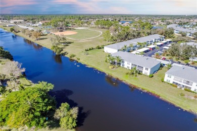Wonderful opportunity to own on THE COCOPLUM WATERWAY! GORGEOUS on Sabal Trace Golf and Country Club in Florida - for sale on GolfHomes.com, golf home, golf lot