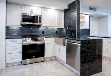 Beautifully renovated 2-bedroom, 2-bath condo in desirable Palm on Palm-Aire Country Club and Resort - Palms in Florida - for sale on GolfHomes.com, golf home, golf lot