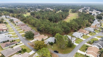 Charming 3-Bedroom, 2-Bath Home in Oak Run - A Premier 55+ Golf on Royal Oaks Golf Club in Florida - for sale on GolfHomes.com, golf home, golf lot