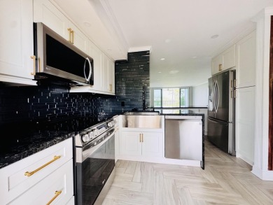 Beautifully renovated 2-bedroom, 2-bath condo in desirable Palm on Palm-Aire Country Club and Resort - Palms in Florida - for sale on GolfHomes.com, golf home, golf lot