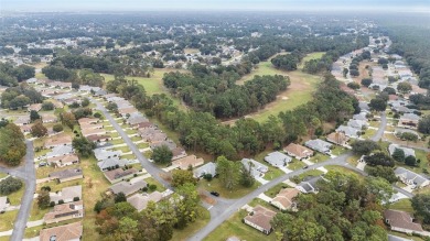 Charming 3-Bedroom, 2-Bath Home in Oak Run - A Premier 55+ Golf on Royal Oaks Golf Club in Florida - for sale on GolfHomes.com, golf home, golf lot