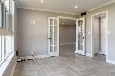 Beautifully renovated 2-bedroom, 2-bath condo in desirable Palm on Palm-Aire Country Club and Resort - Palms in Florida - for sale on GolfHomes.com, golf home, golf lot
