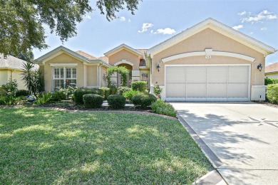 RARELY AVAILABLE POOL (SALTWATER W/HOT TUB) HOME IN WONDERFUL on Eagle Ridge At Spruce Creek Country Club in Florida - for sale on GolfHomes.com, golf home, golf lot