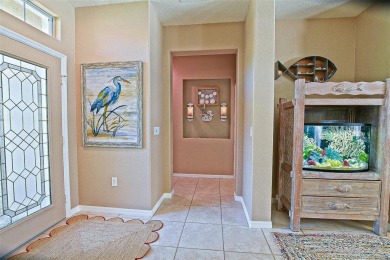RARELY AVAILABLE POOL (SALTWATER W/HOT TUB) HOME IN WONDERFUL on Eagle Ridge At Spruce Creek Country Club in Florida - for sale on GolfHomes.com, golf home, golf lot