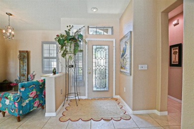RARELY AVAILABLE POOL (SALTWATER W/HOT TUB) HOME IN WONDERFUL on Eagle Ridge At Spruce Creek Country Club in Florida - for sale on GolfHomes.com, golf home, golf lot