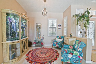 RARELY AVAILABLE POOL (SALTWATER W/HOT TUB) HOME IN WONDERFUL on Eagle Ridge At Spruce Creek Country Club in Florida - for sale on GolfHomes.com, golf home, golf lot