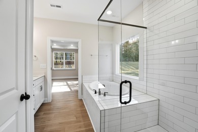 ONE OF TWO LAST REMAINING NEW HOMES...Eastwood Homes' stately on Woodside Plantation Country Club in South Carolina - for sale on GolfHomes.com, golf home, golf lot