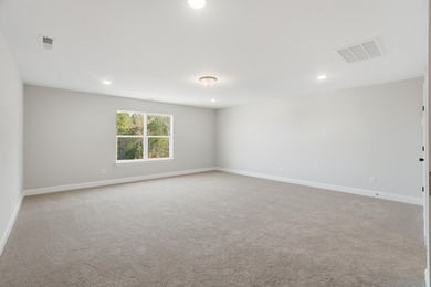 ONE OF TWO LAST REMAINING NEW HOMES...Eastwood Homes' stately on Woodside Plantation Country Club in South Carolina - for sale on GolfHomes.com, golf home, golf lot