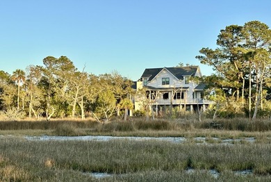 Southern charm meets coastal elegance in this beautifully on Wild Dunes Harbor Golf Resort in South Carolina - for sale on GolfHomes.com, golf home, golf lot