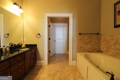 You won't beat the big water views at this beautiful move in on The Golf Club at Cuscowilla in Georgia - for sale on GolfHomes.com, golf home, golf lot