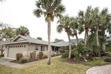 Discover the charm and comfort of this newly listed home nestled on Plantation Bay Golf and Country Club in Florida - for sale on GolfHomes.com, golf home, golf lot