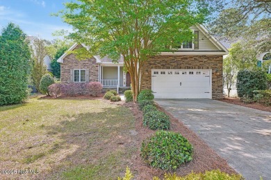 This thoughtfully designed home offers tranquil views of the on Members Club At St. James Plantation in North Carolina - for sale on GolfHomes.com, golf home, golf lot