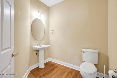 This thoughtfully designed home offers tranquil views of the on Members Club At St. James Plantation in North Carolina - for sale on GolfHomes.com, golf home, golf lot