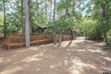 This lovely Hideaway Lake bungalow type home is ready for your on Hide-A-Way Lake Golf Course in Texas - for sale on GolfHomes.com, golf home, golf lot