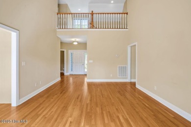 This thoughtfully designed home offers tranquil views of the on Members Club At St. James Plantation in North Carolina - for sale on GolfHomes.com, golf home, golf lot