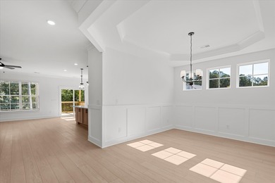 Discover Southern elegance in this exquisite Wescott Elevation A on Woodside Plantation Country Club in South Carolina - for sale on GolfHomes.com, golf home, golf lot