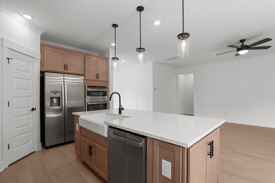 Discover Southern elegance in this exquisite Wescott Elevation A on Woodside Plantation Country Club in South Carolina - for sale on GolfHomes.com, golf home, golf lot