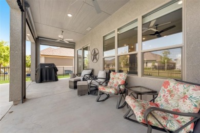 Charming 2-Bedroom, 2-Bath Home with Office in Robson Ranch on Wildhorse Golf Club of Robson Ranch in Texas - for sale on GolfHomes.com, golf home, golf lot