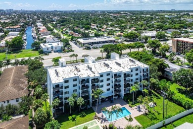 AMAZING OPPORTUNITY to own this 2-bedroom, 2-bath condo  walking on Pompano Beach Golf Course  in Florida - for sale on GolfHomes.com, golf home, golf lot