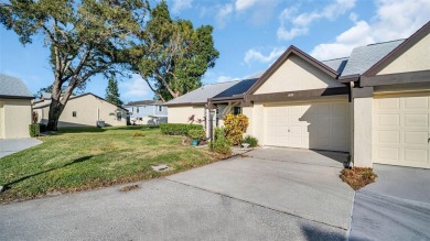Enjoy FREE GOLF and MAINTENANCE-FREE LIVING in this Villa that on Highland Lakes Executive Golf Course in Florida - for sale on GolfHomes.com, golf home, golf lot