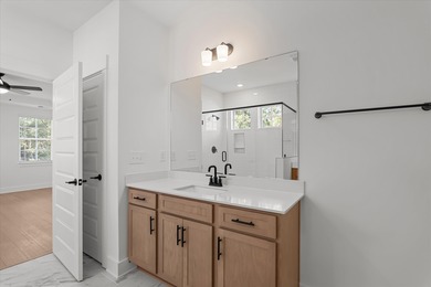 ONE OF TWO LAST REMAINING NEW HOMES...Discover Southern elegance on Woodside Plantation Country Club in South Carolina - for sale on GolfHomes.com, golf home, golf lot