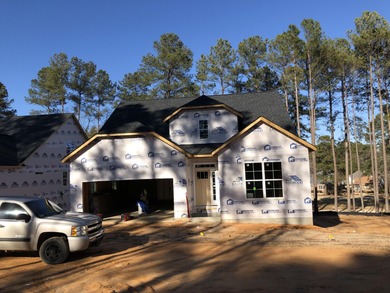 ONE OF TWO LAST REMAINING NEW HOMES...Discover Southern elegance on Woodside Plantation Country Club in South Carolina - for sale on GolfHomes.com, golf home, golf lot