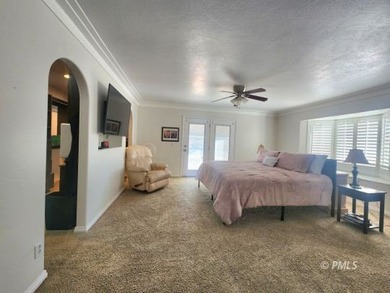 Panoramic views and an unbeatable location highlight this 6 bed on Lake Powell National Golf Course in Arizona - for sale on GolfHomes.com, golf home, golf lot