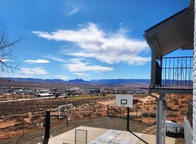 Panoramic views and an unbeatable location highlight this 6 bed on Lake Powell National Golf Course in Arizona - for sale on GolfHomes.com, golf home, golf lot