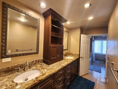 Panoramic views and an unbeatable location highlight this 6 bed on Lake Powell National Golf Course in Arizona - for sale on GolfHomes.com, golf home, golf lot