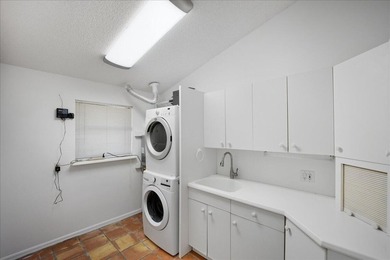 Charming 3-bedroom, 2-bath single-family home is in the on Santa Lucia River Club in Florida - for sale on GolfHomes.com, golf home, golf lot