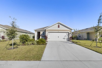 BRAND NEW BETTER THAN NEW D R HORTON BUILT HOME IN BEAUTIFUL on Halifax Plantation Golf Club in Florida - for sale on GolfHomes.com, golf home, golf lot