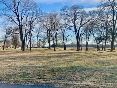 This property is ready for an easy build! A few nice mature on The Coves Golf Course in Oklahoma - for sale on GolfHomes.com, golf home, golf lot