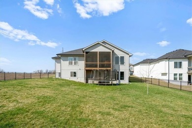 Stunning reverse 1.5-story home filled with natural light from on Shawnee Golf and Country Club in Kansas - for sale on GolfHomes.com, golf home, golf lot
