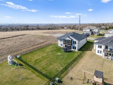 Stunning reverse 1.5-story home filled with natural light from on Shawnee Golf and Country Club in Kansas - for sale on GolfHomes.com, golf home, golf lot