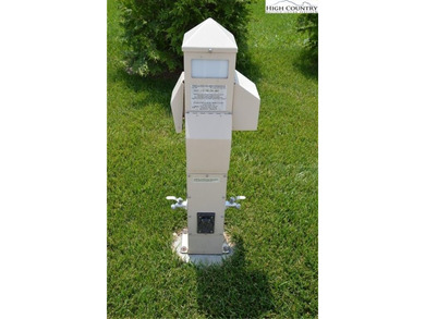 Experience the beauty of the Blue Ridge Mountains at The Village on Olde Beau Golf Course in North Carolina - for sale on GolfHomes.com, golf home, golf lot