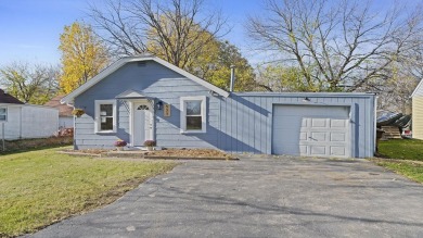 This cozy, updated cottage is the perfect retreat, offering on Ingersoll Golf Course and Learning Links in Illinois - for sale on GolfHomes.com, golf home, golf lot