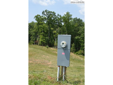 Experience the beauty of the Blue Ridge Mountains at The Village on Olde Beau Golf Course in North Carolina - for sale on GolfHomes.com, golf home, golf lot