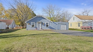 This cozy, updated cottage is the perfect retreat, offering on Ingersoll Golf Course and Learning Links in Illinois - for sale on GolfHomes.com, golf home, golf lot