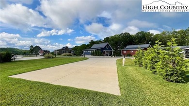 Experience the beauty of the Blue Ridge Mountains at The Village on Olde Beau Golf Course in North Carolina - for sale on GolfHomes.com, golf home, golf lot